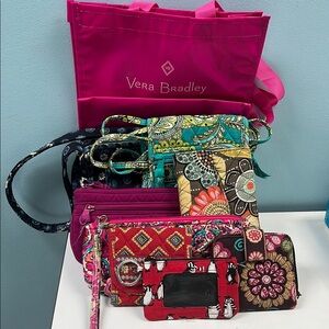 8 Vera Bradley small bags… Zips, coin purse, hipster arm sling. Nice condition!